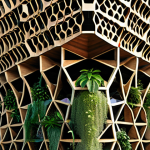 **

Biomimicry architecture: A modern building inspired by the structure of a honeycomb, emphasizing hexagonal patterns and efficient space utilization, integrating natural light and sustainable materials. Exterior should feature vertical gardens and rainwater harvesting systems.

**